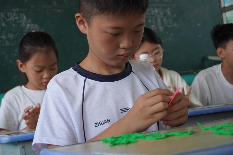 �׹������ͯȤ��֧�̿�������� �����������ׯСѧ7��12�ս�ѧ���ʵ